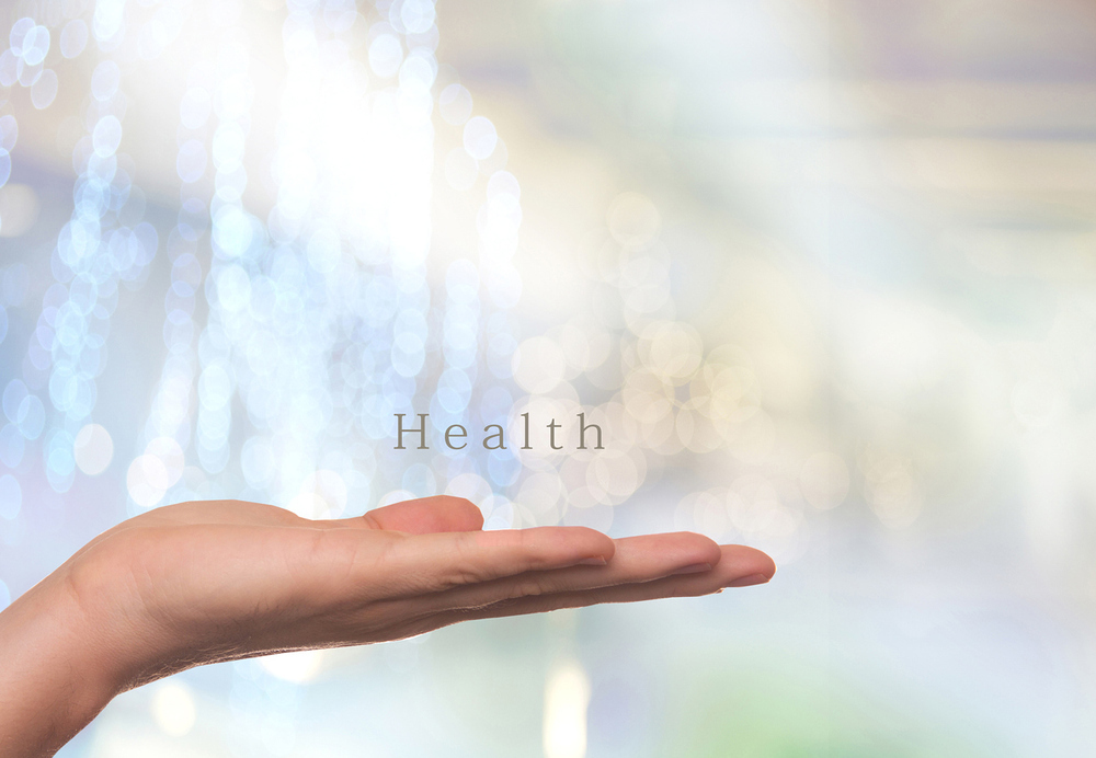 Der Schriftzug 'health' über einer Hand. / iStock/TheaDesign Der Schriftzug 'health' über einer Hand.